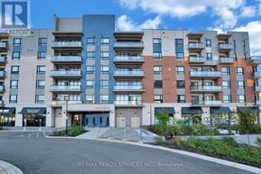 Ottawa condo for rent - A multi-story apartment building with a parking lot in front.