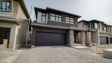 Ottawa apartment for rent - A house with a garage is being sold by RE/MAX Delta Realty Team.