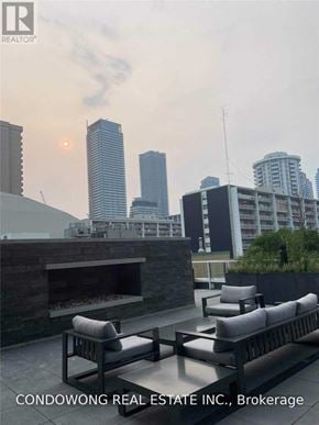 Toronto (Church-Yonge Corridor) condo for rent - A brochure cover for Condowong Real Estate Inc. in Brokerage.