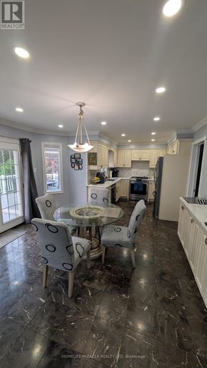Vaughan (East Woodbridge) apartment for rent - A well-lit dining area with a table set for four.