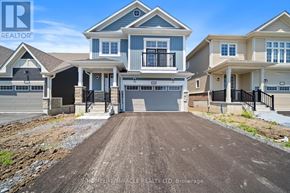 Loyalist (Bath) apartment for rent - A real estate company is showcasing a residential area with houses and a dirt road.