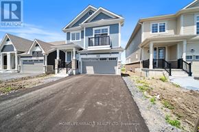 Loyalist (Bath) apartment for rent - A real estate photo of a house with a driveway in front.