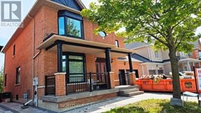 Vaughan (Vellore Village) apartment for rent - A brick house with a sign that says "WORLD GLASS REALTY POINT Brokerage".