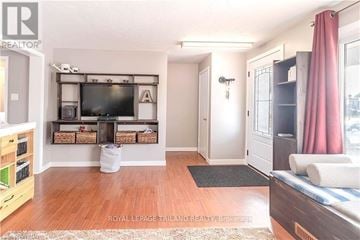 London East (East D) apartment for rent - A living room with a television and a couch.