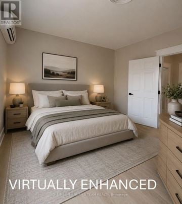 Grimsby (Grimsby East) house for rent - A bedroom with a large bed and a painting on the wall.