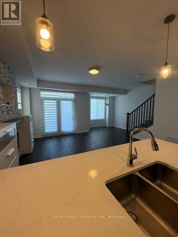 Mississauga (Churchill Meadows) townhouse for rent - A kitchen with a sink and a window.