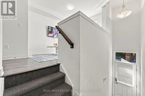 Hamilton (Parkview) townhouse for rent - A white interior of a house with a staircase leading to the second floor.