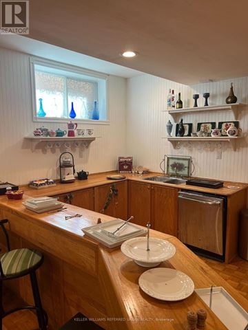 Richmond Hill (South Richvale) apartment for rent - A kitchen with a wooden counter and white walls.