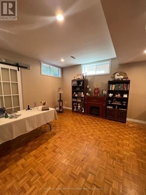 Richmond Hill (South Richvale) apartment for rent - A room with wooden flooring and a table with a white cloth.