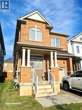 Niagara Falls apartment for rent - A house with a car parked in front.