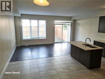 Niagara Falls apartment for rent - A kitchen with a sink and a window.