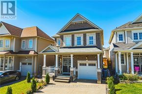 Hamilton (Binbrook) apartment for rent - A row of houses with the logo MAX ESCARMENT REALTY INC. BROKERAGE on the front.