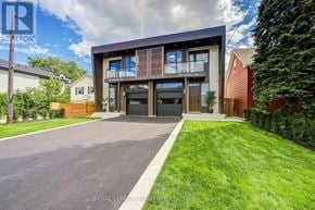 Mississauga (Lakeview) apartment for rent - A modern house with a large front yard is for sale.