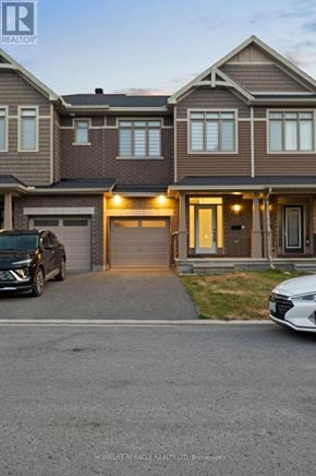 Ottawa townhouse for rent - A modern two-story house with a garage and a car parked in front.