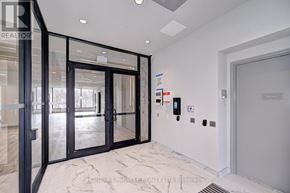 Waterloo condo for rent - A glass door entrance to a building with a sign that says "REALTOR".