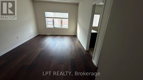 Brampton (Northwest Brampton) apartment for rent - A room with wooden floors and a window is for sale.