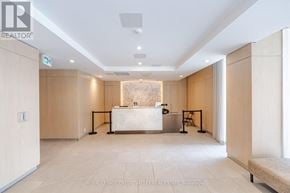 Brampton (Northwest Brampton) condo for rent - A reception area with a desk and chairs.