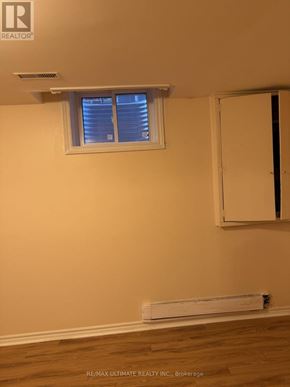 Brampton (Northwest Sandalwood Parkway) apartment for rent - A room with a window and a door.