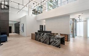 Milton (Tm Timberlea) house for rent - A spacious living room with a marble countertop and a modern design.