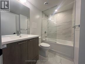 Vaughan (Concord) condo for rent - A bathroom with a sink, toilet and bathtub.