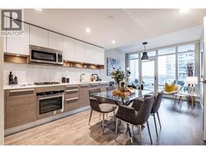 Burnaby apartment for rent - A modern kitchen with a dining table and chairs.