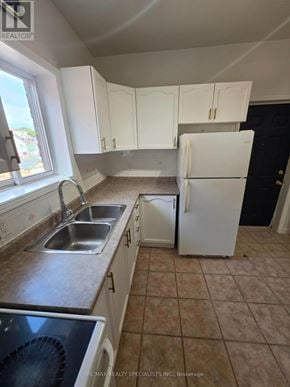 Hamilton (Landsdale) apartment for rent - A kitchen with a sink, dishwasher, and refrigerator.
