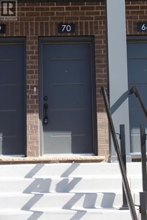 Guelph (Clairfields/Hanlon Business Park) townhouse for rent - The number 70 is on the wall above the door.