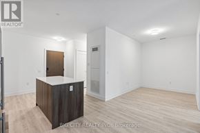 Toronto (Banbury-Don Mills) condo for rent - A realtor's office with a white reception desk and a white wall.