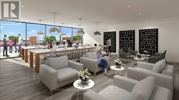 Brant (Brantford Twp) condo for rent - A modern living room with grey couches and a large window.