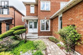 Mississauga (Hurontario) apartment for rent - A red brick house with a white door and windows.