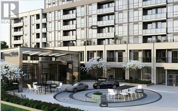 Milton (Tm Timberlea) apartment for rent - A modern building with a glass facade and a car parked in front.
