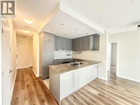Vancouver apartment for rent - A kitchen with a sink and cabinets in a house.