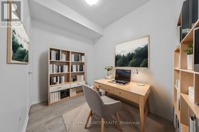 Toronto (Niagara) condo for rent - A room with a desk, chair, and bookshelf.
