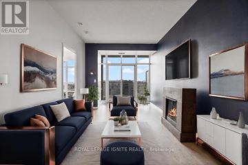 Toronto (Niagara) condo for rent - A modern living room with a dark blue sofa and a fireplace.