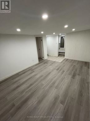 Hamilton (Landsdale) triplex for rent - A room with wooden flooring and white walls.