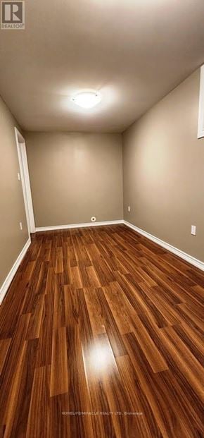 Milton (Ha Harrison) townhouse for rent - A room with wooden flooring and white walls.