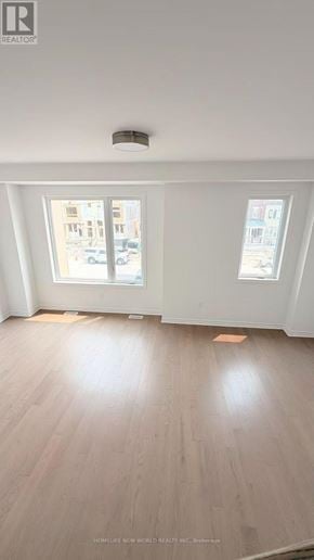 Markham townhouse for rent - A room with a window and a tablet on the wall.