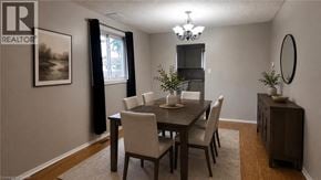 Milton apartment for rent - A dining room with a table set for four.