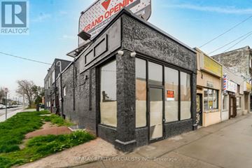 Hamilton (Crown Point) apartment for rent - A kitchen with white cabinets and a black microwave.