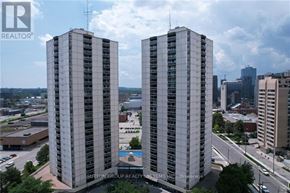 London East (East K) condo for rent - Two tall buildings are shown with a pool in the middle and a logo on the bottom left.