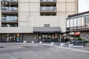 London East (East K) condo for rent - A building with the number 323 on it and a sign that says "The Childrens Centre".
