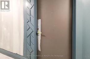 Hamilton (Kirkendall) house for rent - A glass door with a paper taped to it.