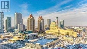 Mississauga (City Centre) condo for rent - A cityscape with a REALTOR® logo in the top left corner.
