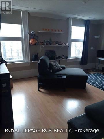 Caledon (Bolton West) multi-family for rent - A living room with a black couch and a television.