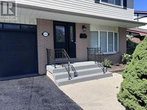 Hamilton (Gilbert) apartment for rent - A house with a black door and a small porch.