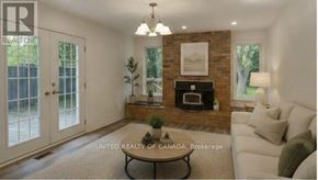 Richmond Hill (North Richvale) apartment for rent - A living room with a fireplace and a couch.