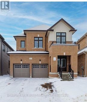 Georgina (Keswick North) apartment for rent - A two-story brick house with a balcony on the second floor.