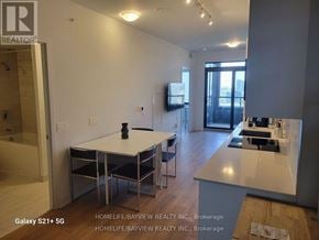 Vaughan (Concord) condo for rent - A real estate listing photo of a home interior with a kitchen and dining area.