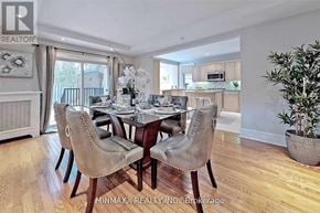 Toronto (Rosedale-Moore Park) apartment for rent - A dining room with a table set for four and a view of the kitchen.