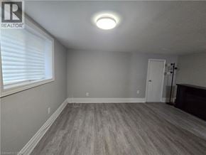 Hamilton apartment for rent - A room with a grey floor and a white ceiling.